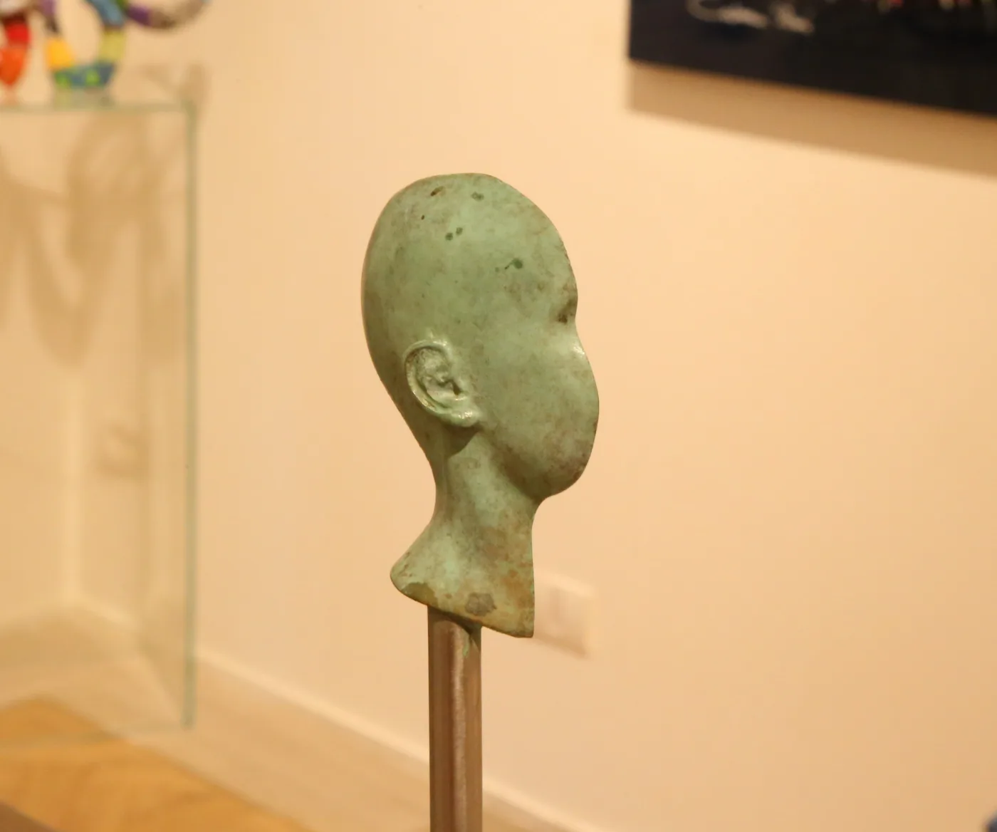 Singularity in Green Bronze